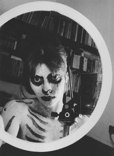With a Round Mirror
